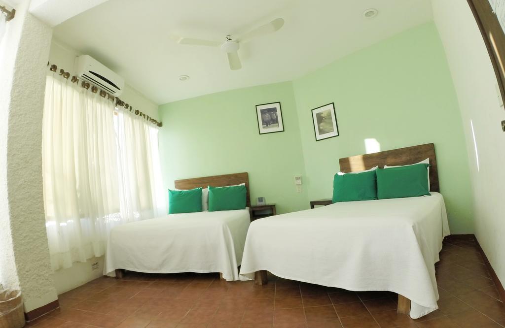 Hotel Puerto Piedra Пуэрто-Эскондидо Экстерьер фото