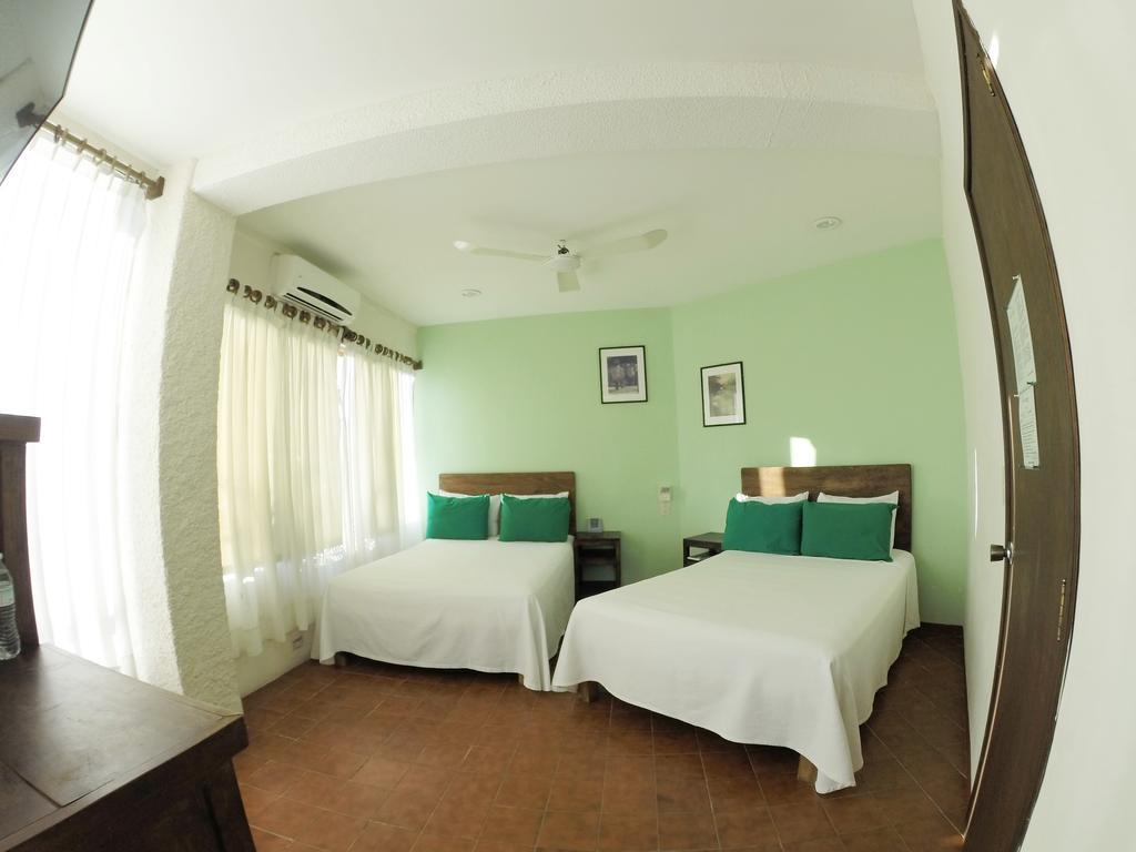Hotel Puerto Piedra Пуэрто-Эскондидо Экстерьер фото
