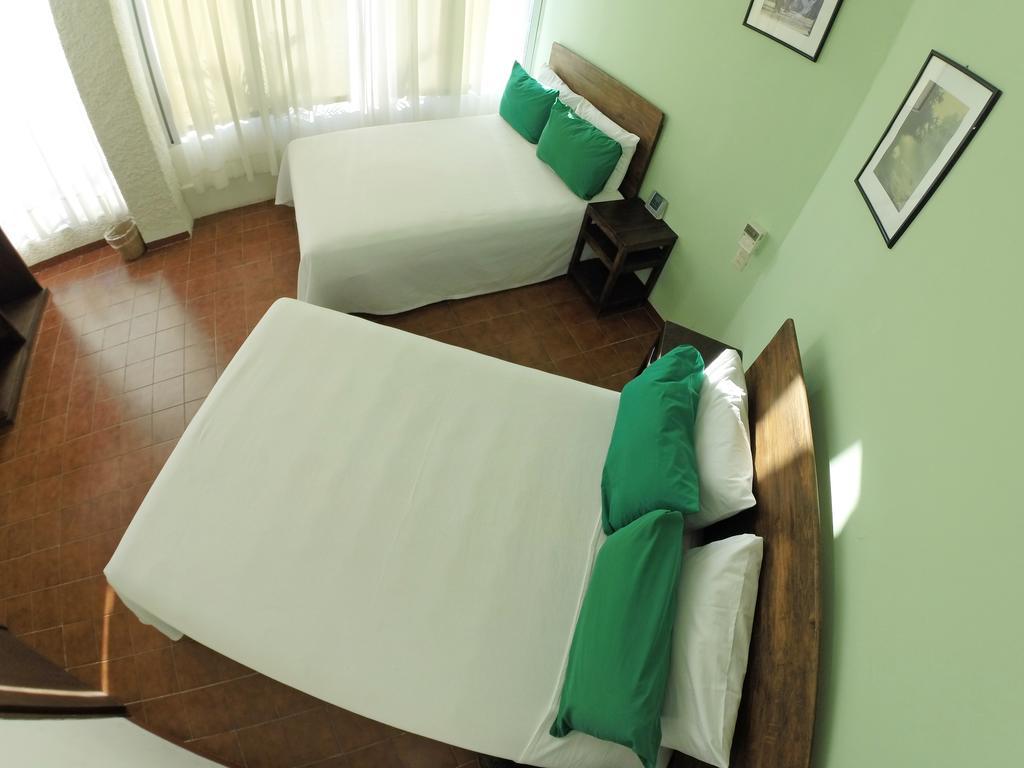 Hotel Puerto Piedra Пуэрто-Эскондидо Экстерьер фото
